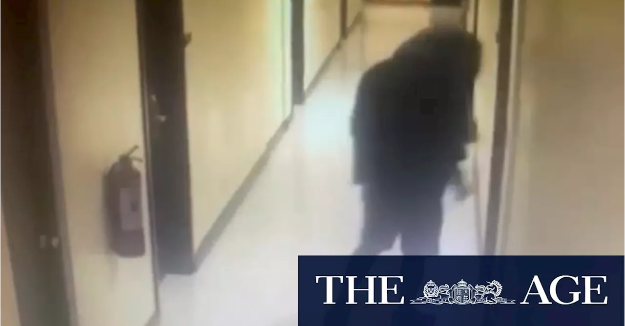 Masked man captured on CCTV leaving Philippines hotel room of two dead Australians