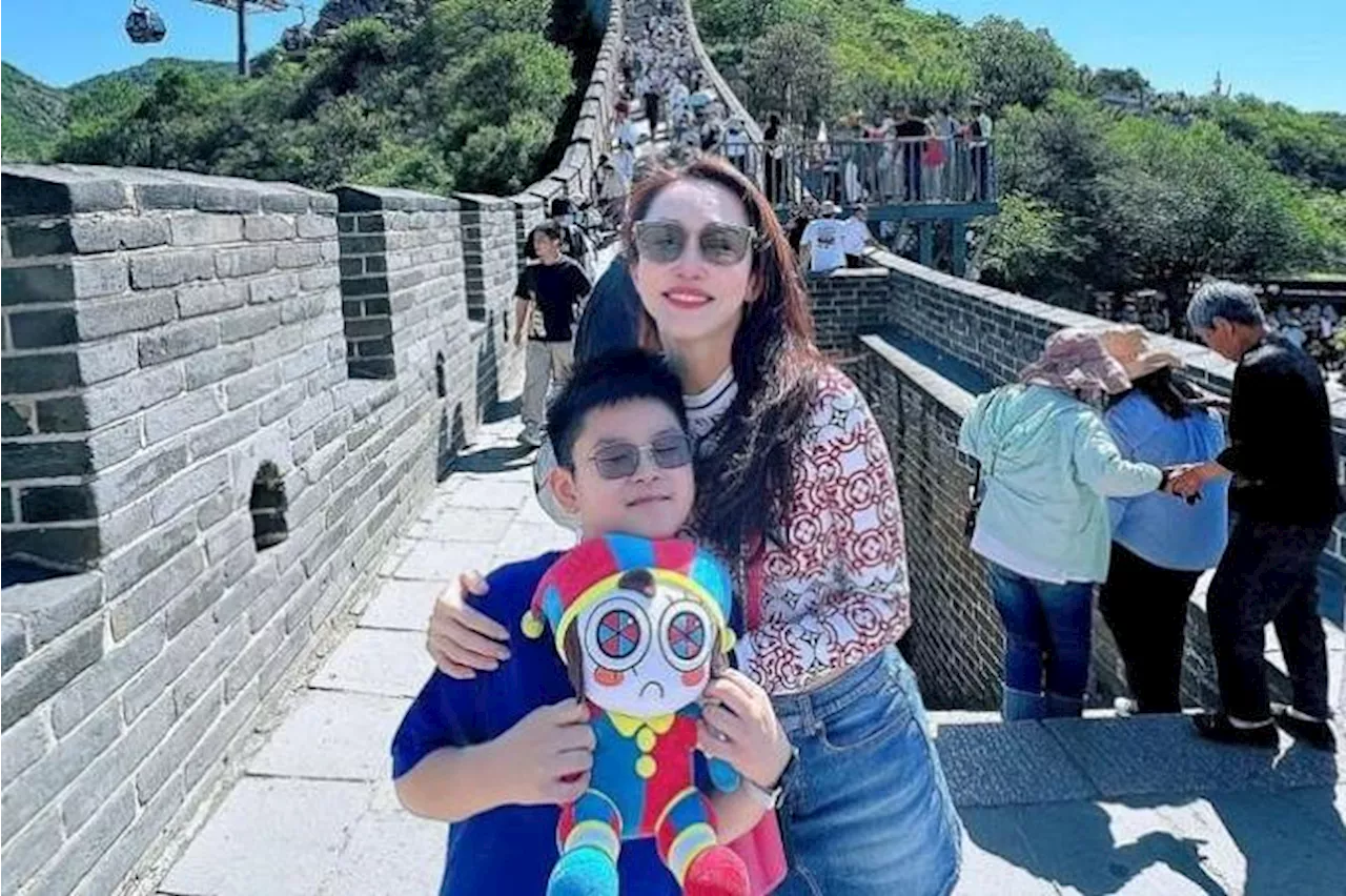 Fann Wong and son scale only 5m on Great Wall of China