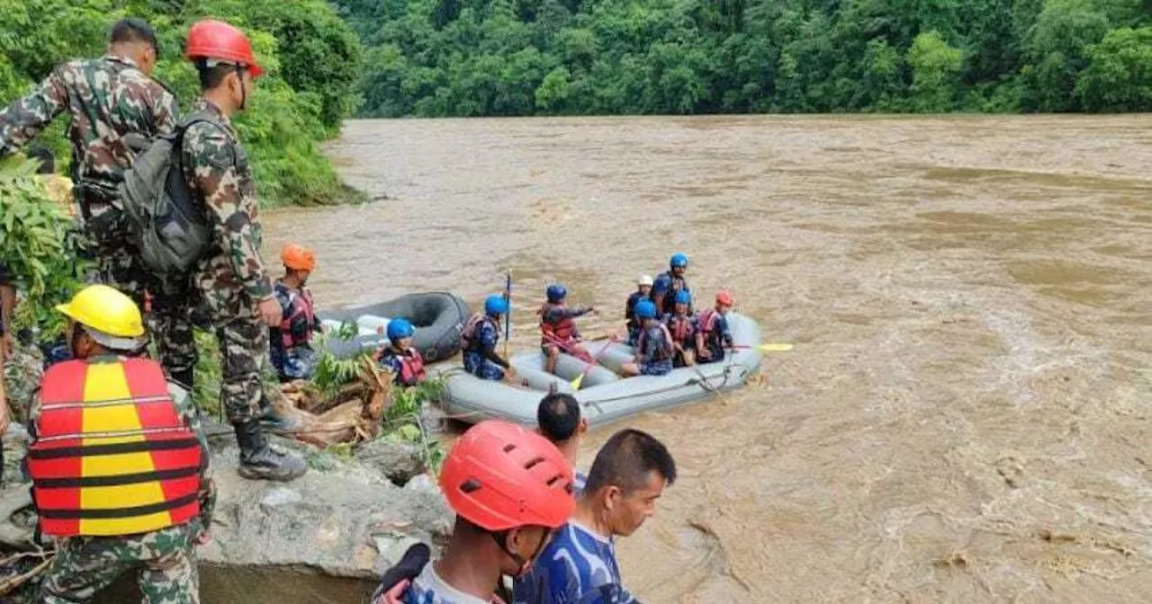 Landslide in Nepal sweeps 2 buses into monsoon-swollen river, leaving 51 people missing