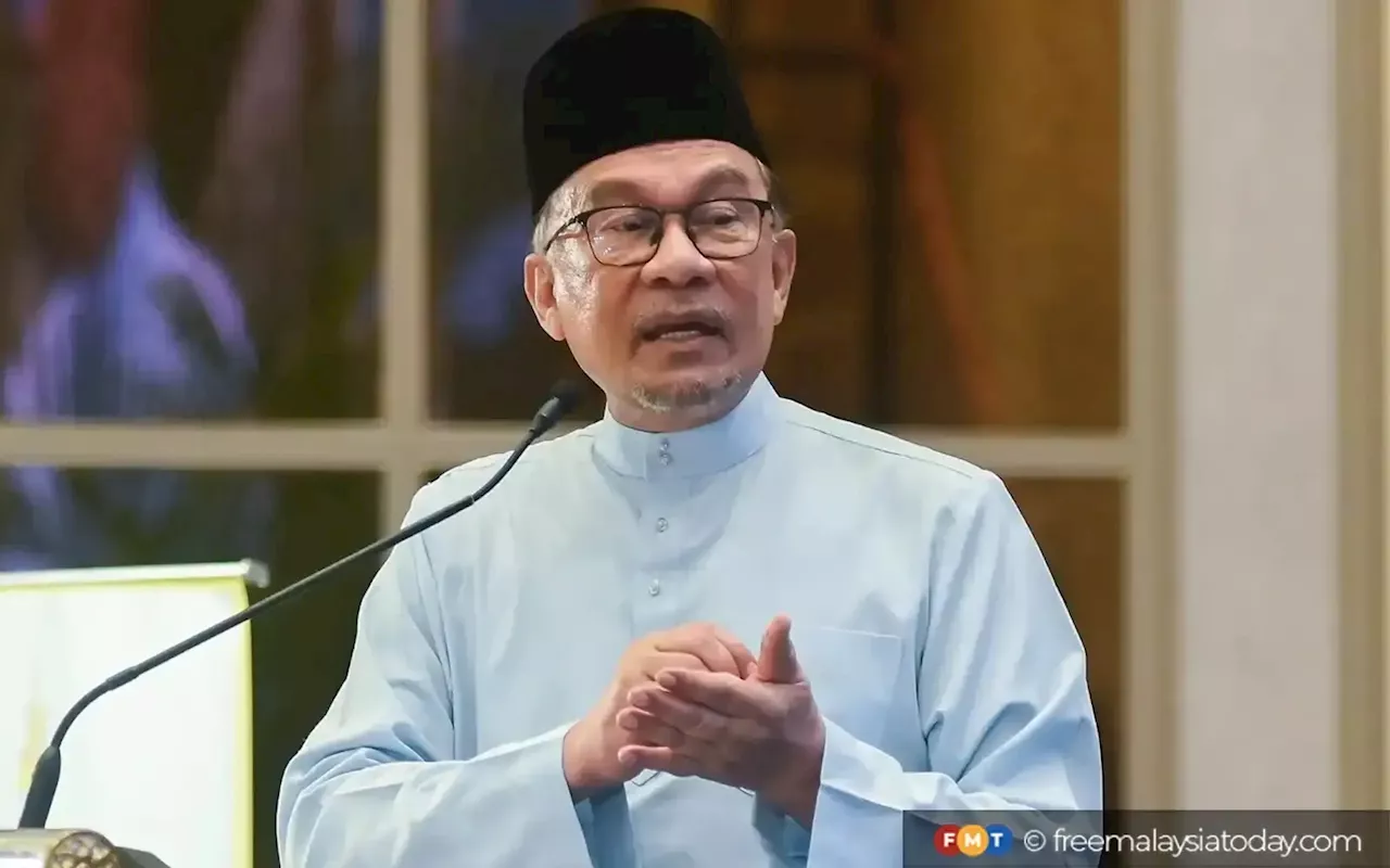 Anwar says govt open to amending anti-hopping law