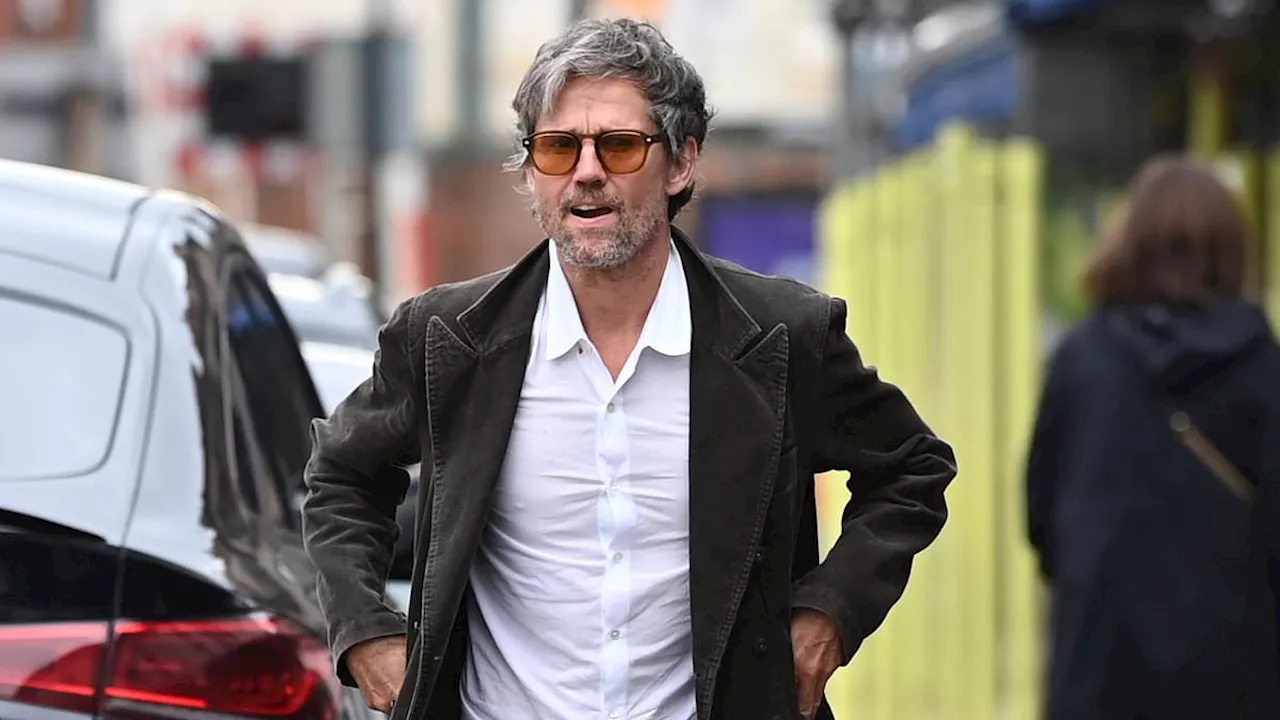 Jason Orange looks unrecognisable from his boy band days as he steps out in Cheshire while Take That...