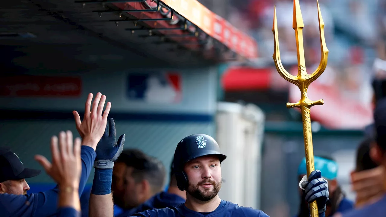 Raleigh homers from each side of plate for 2nd time, Mariners rout Angels 11-0