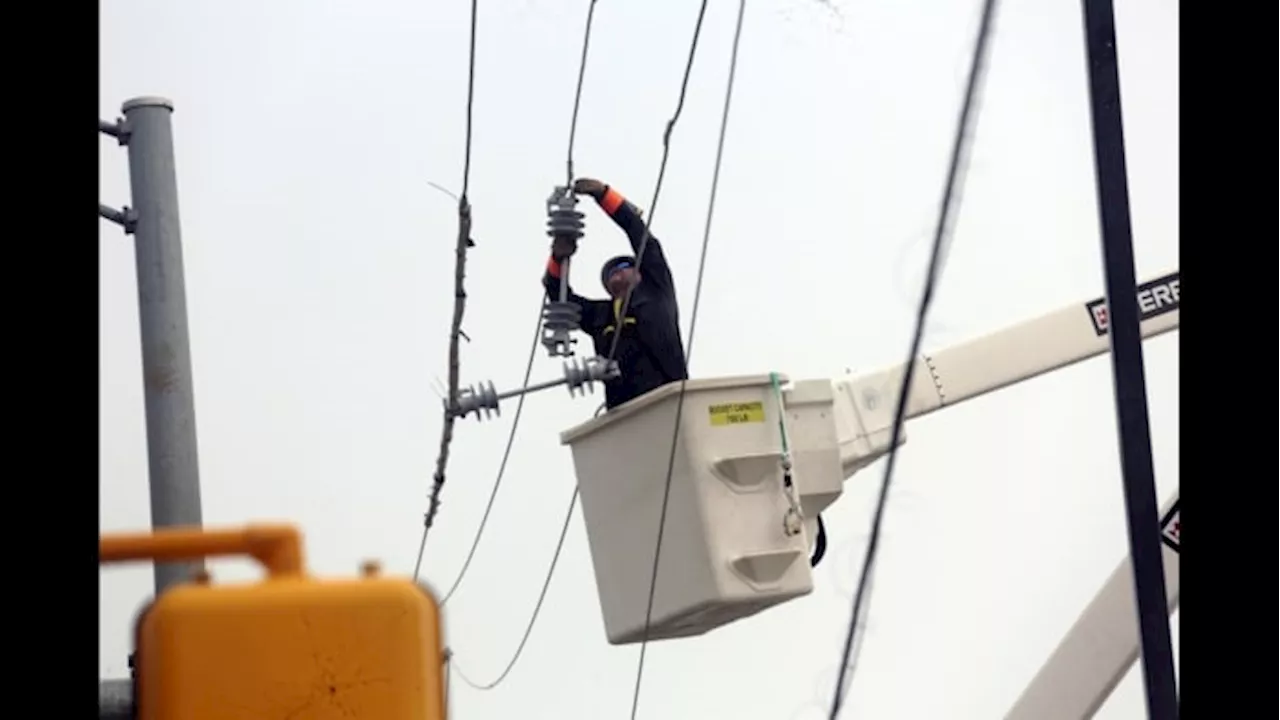 Why are CenterPoint Energy workers sitting, waiting at staging areas?