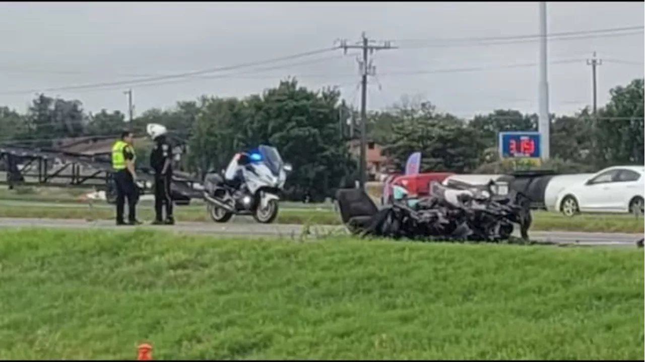 Car crashes into 18-wheeler on Loop 410, causing it to catch fire and split in two; lanes closed on SW Side