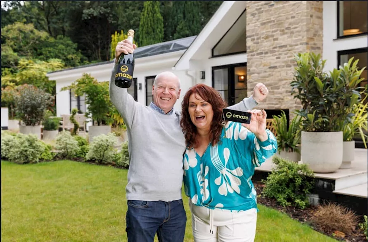 Couple win Omaze prize draw £3m Surrey home and can retire and live mortgage-free