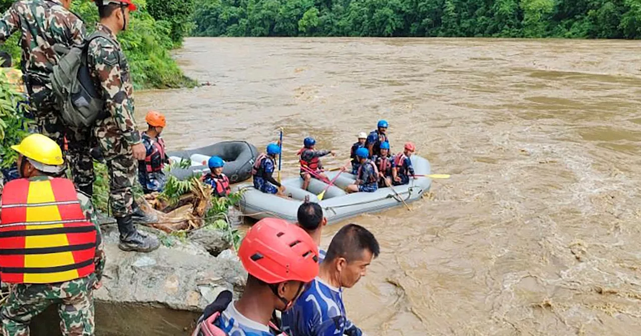 Buses carrying at least 60 people swept into river by landslide in Nepal