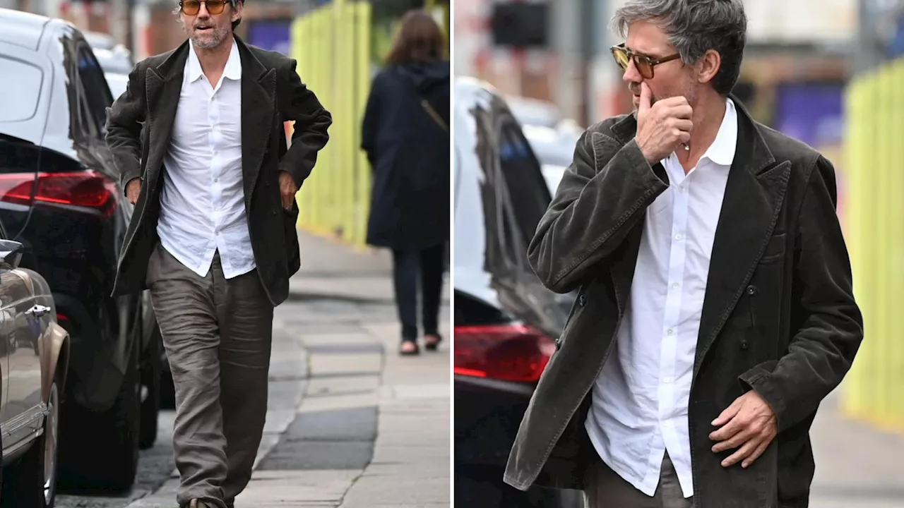 Jason Orange looks worlds away from Take That days as ex boy band star makes rare outing...