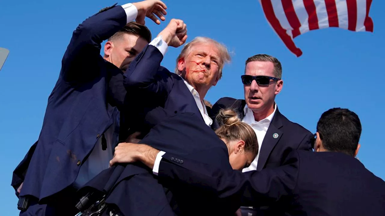 Donald Trump rushed off stage by secret service after shots possibly fired