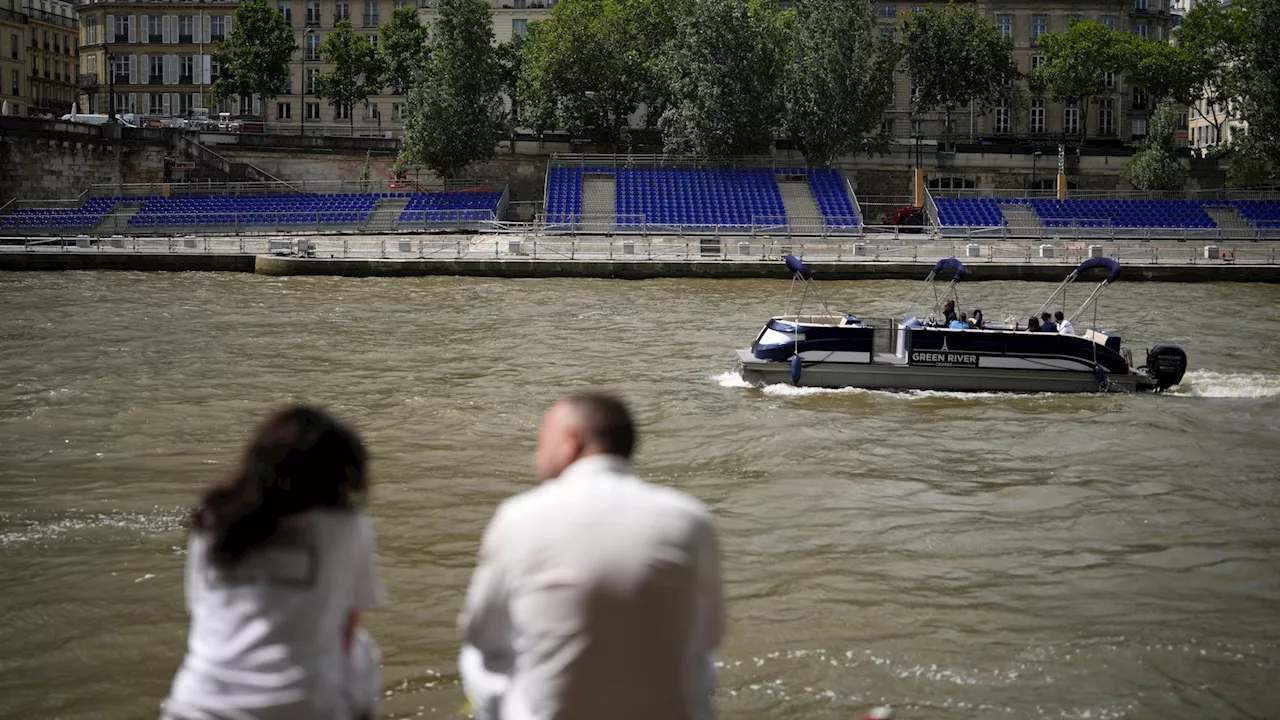 French sports minister takes a dip in the Seine ahead of Paris Olympics