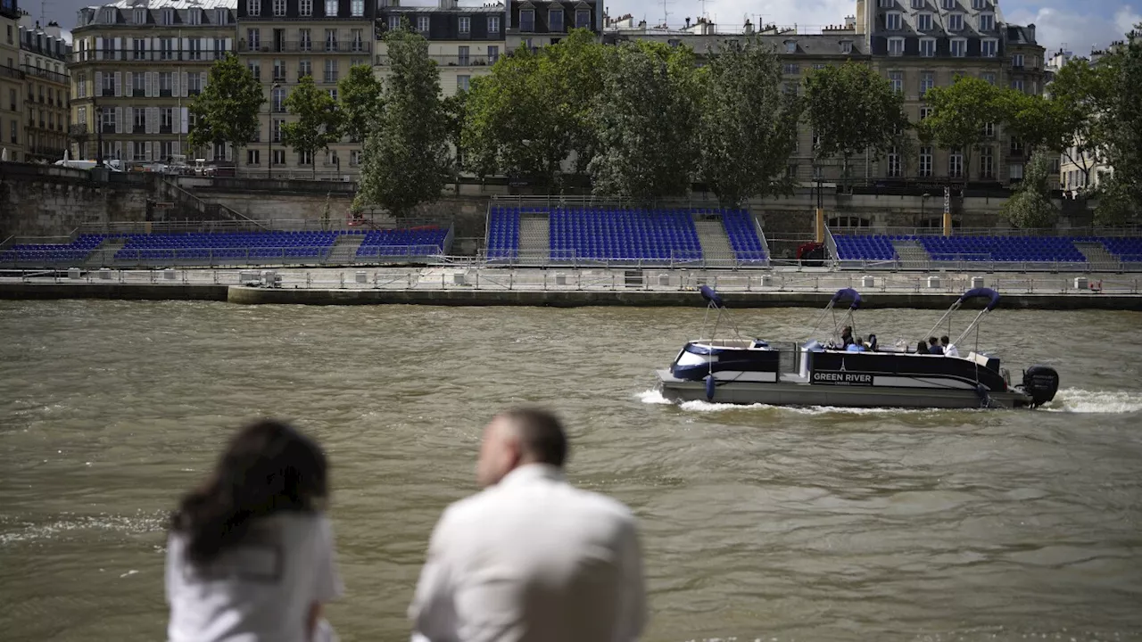 French sports minister takes a dip in the Seine ahead of Paris Olympics