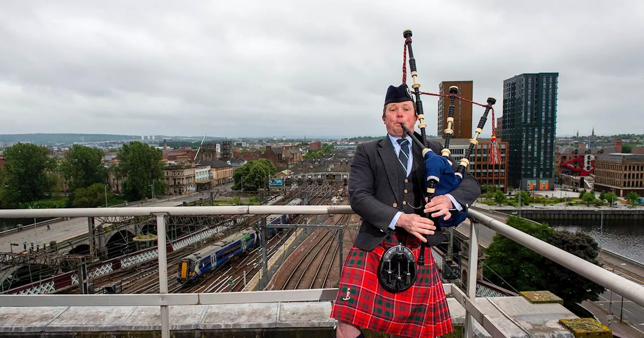 Brave piper scales Glasgow Central Station roof to honour armed forces