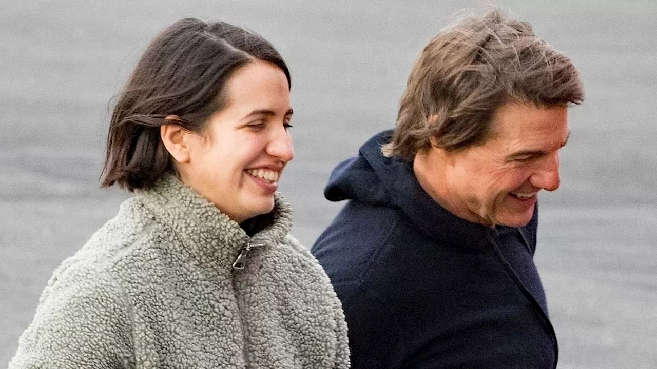 Tom Cruise, 62, is the perfect gentleman as he helps singer Victoria Canal, 25, out of his...