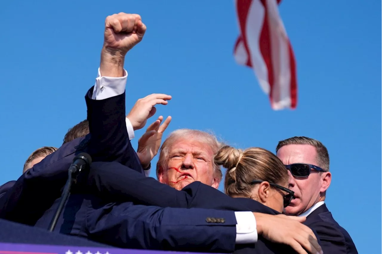 Donald Trump whisked off stage in Pennsylvania after apparent gunshots rang through the crowd