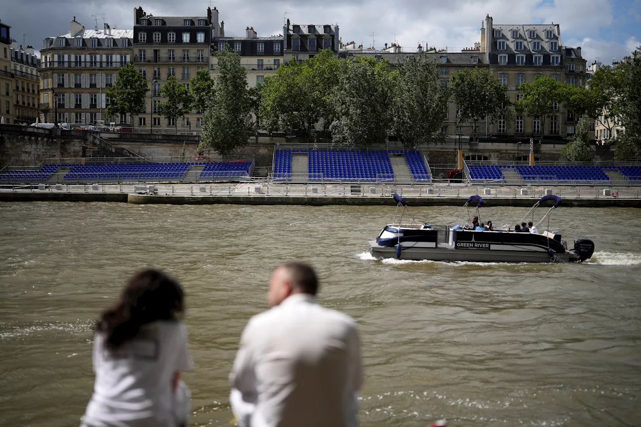 French sports minister takes a dip in the Seine ahead of Paris Olympics