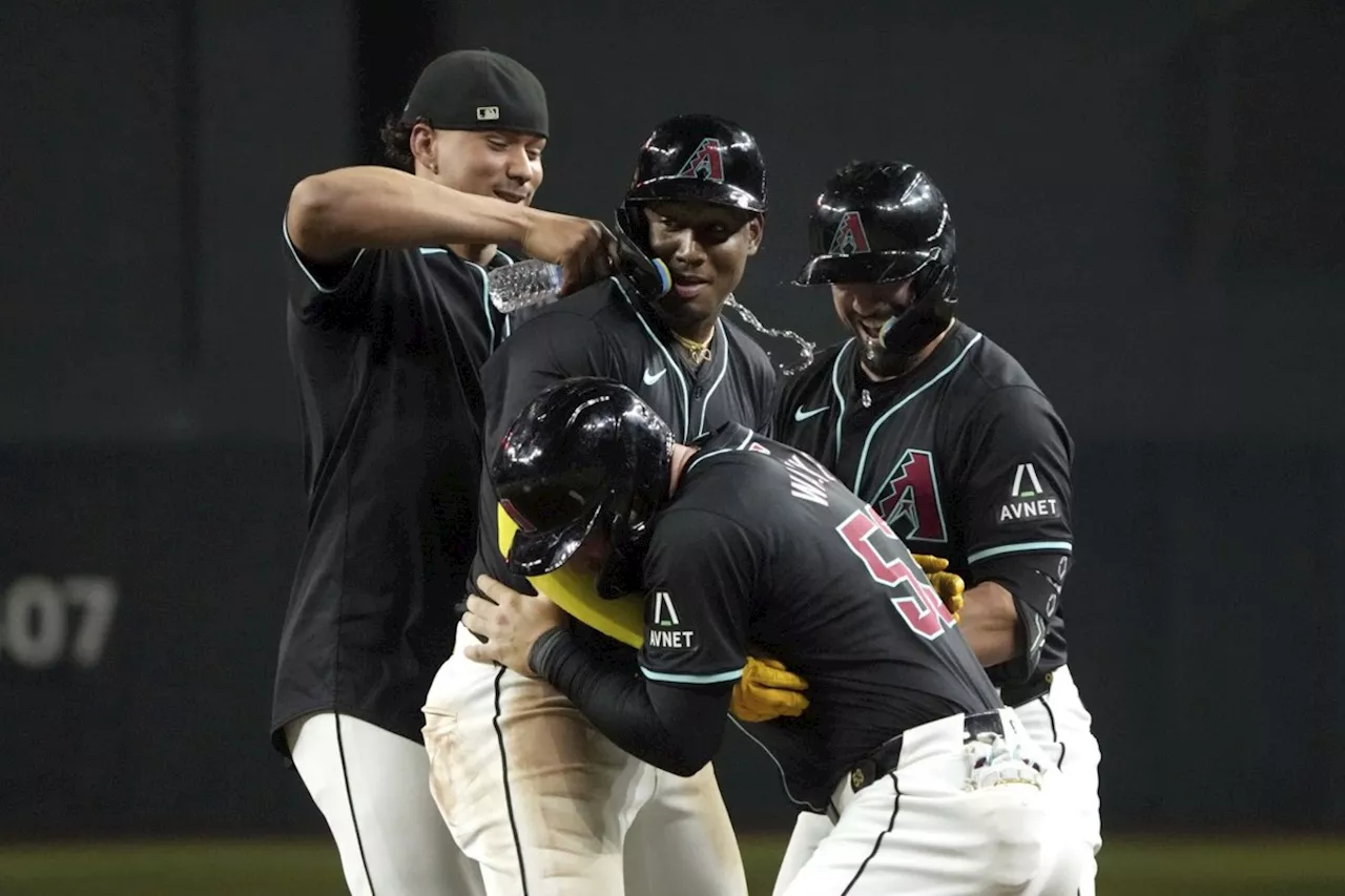 Geraldo Perdomo drives in 9th run with sac fly to lift the Diamondbacks past the Blue Jays, 5-4