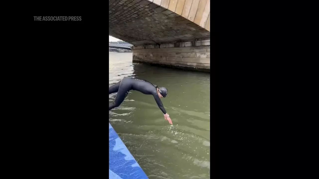 French minister takes plunge into Seine river, less than 2 weeks before start of Paris 2024 Olympics