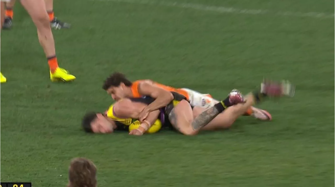 Toby Bedford faces nervous wait for heavy tackle on Tim Taranto during Giants’ win over Tigers