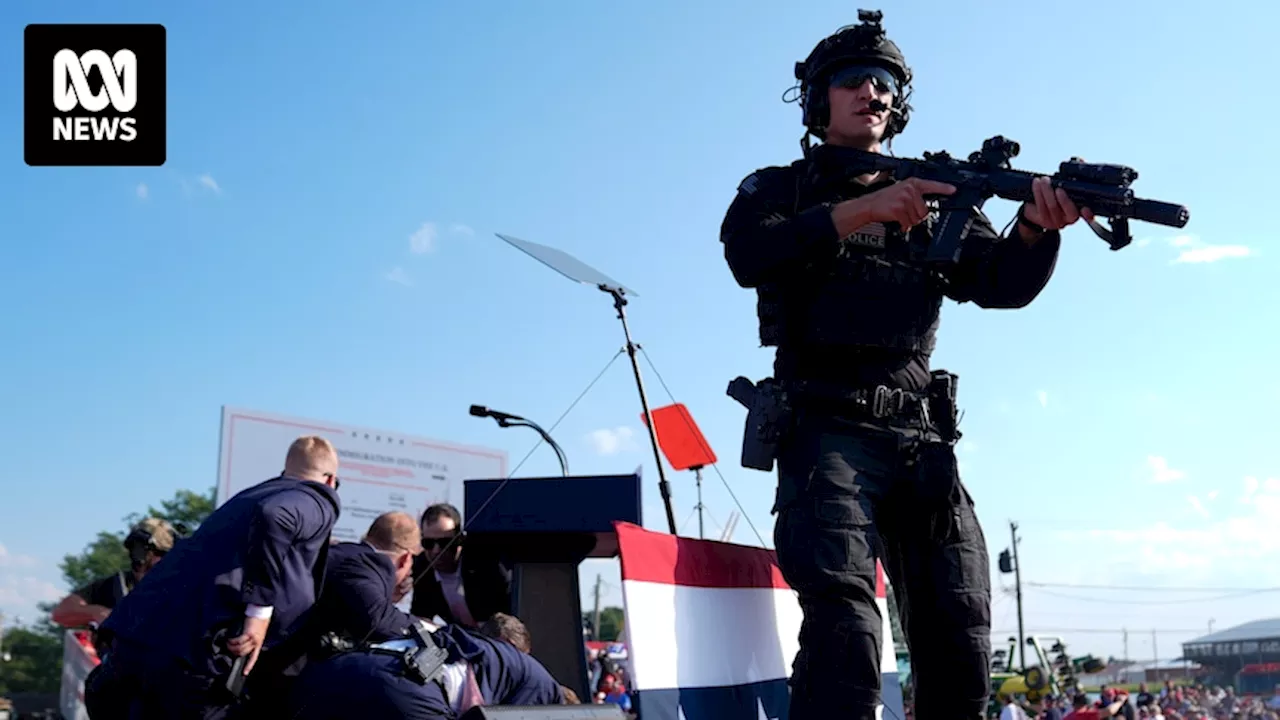 Witnesses say a gunman was spotted on roof near Donald Trump rally minutes before assassination attempt