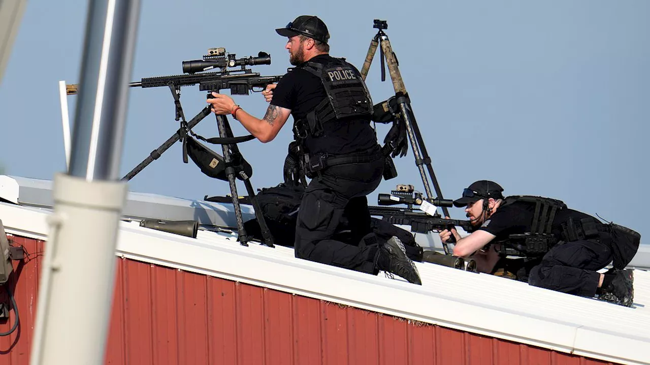 Moment Secret Service snipers shoot gunmen who shot Donald Trump