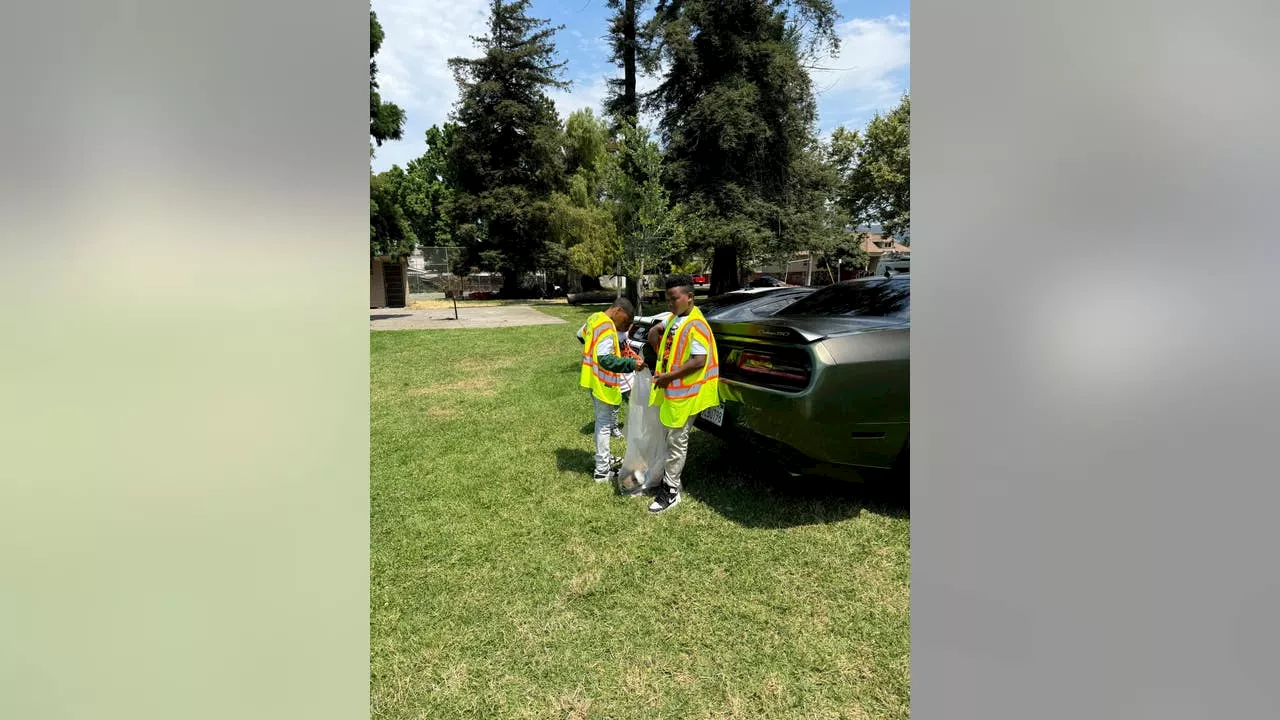 East Oakland community comes together to pick up trash, beautify park