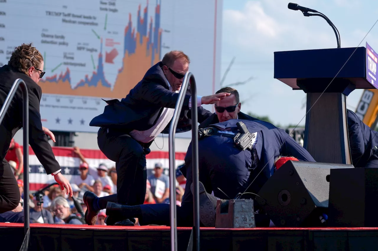 U.S. Rep. Dan Meuser, from stage right, describes Trump shooting