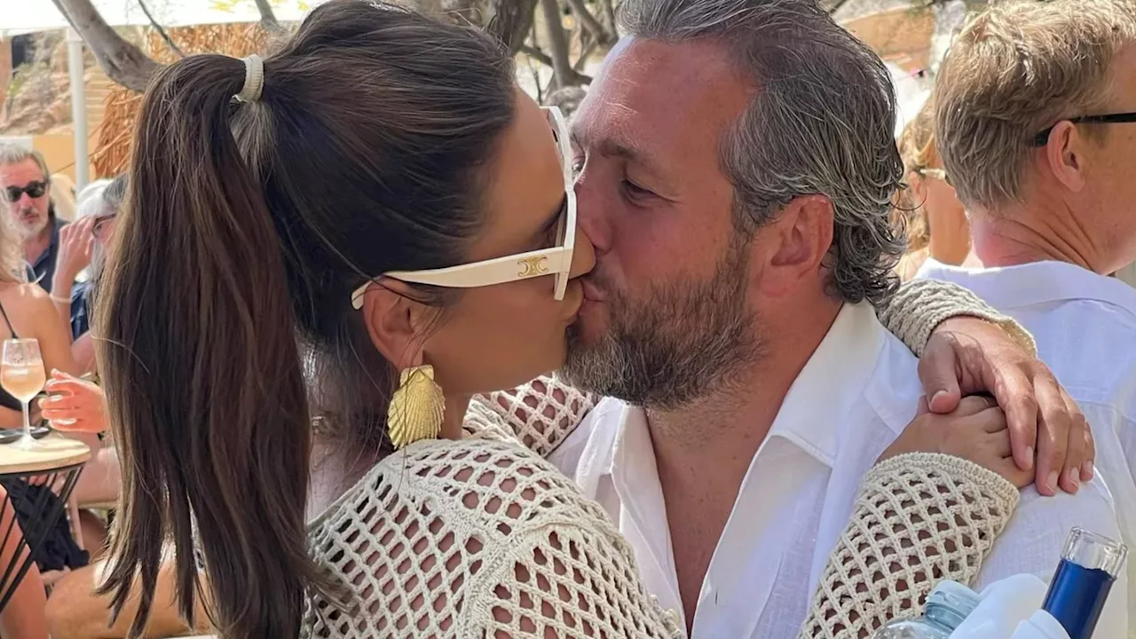 Samantha Faiers passionately kisses partner Paul in see-through dress...