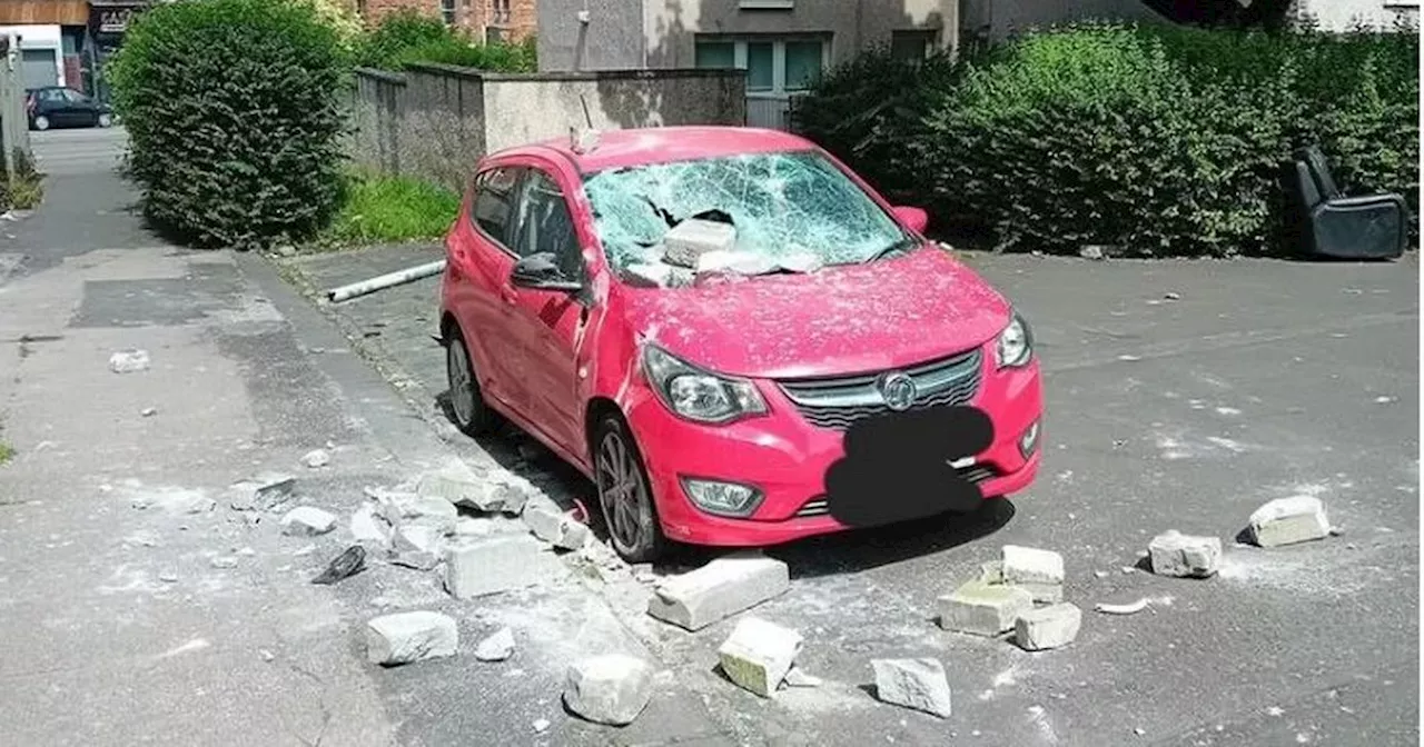 Car windscreen smashed in as concrete blocks launched from 'abandoned building'