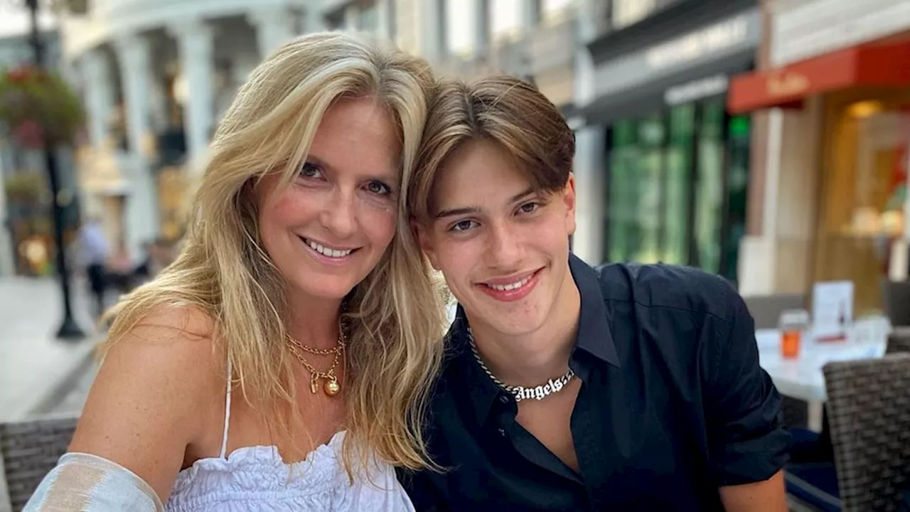 Penny Lancaster rocks crochet mini dress in holiday snap with towering model son Alastair