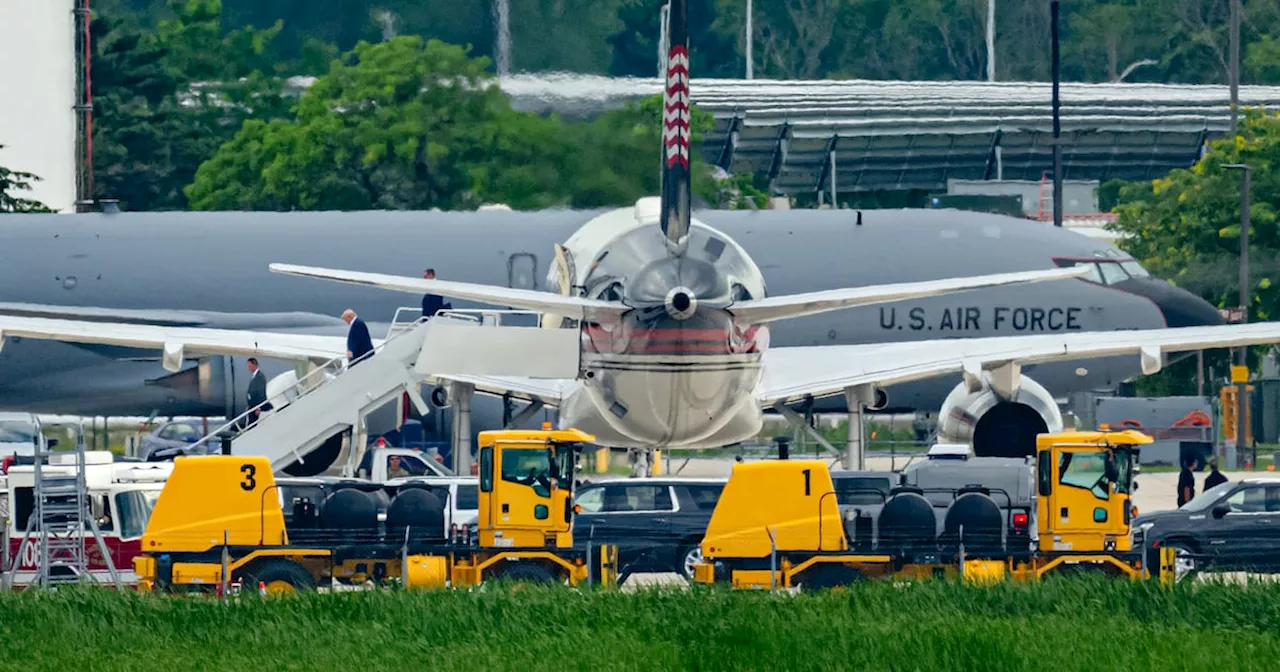 Trump arrives in Milwaukee as Biden urges US to ‘lower temperature in politics’