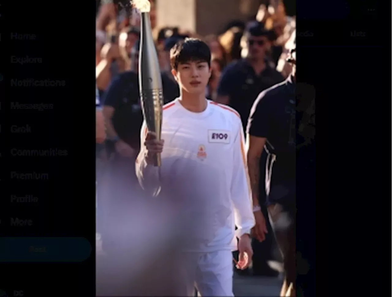 Olympic Torch Relay Fan cheers greet BTS’ Jin as first torchbearer for