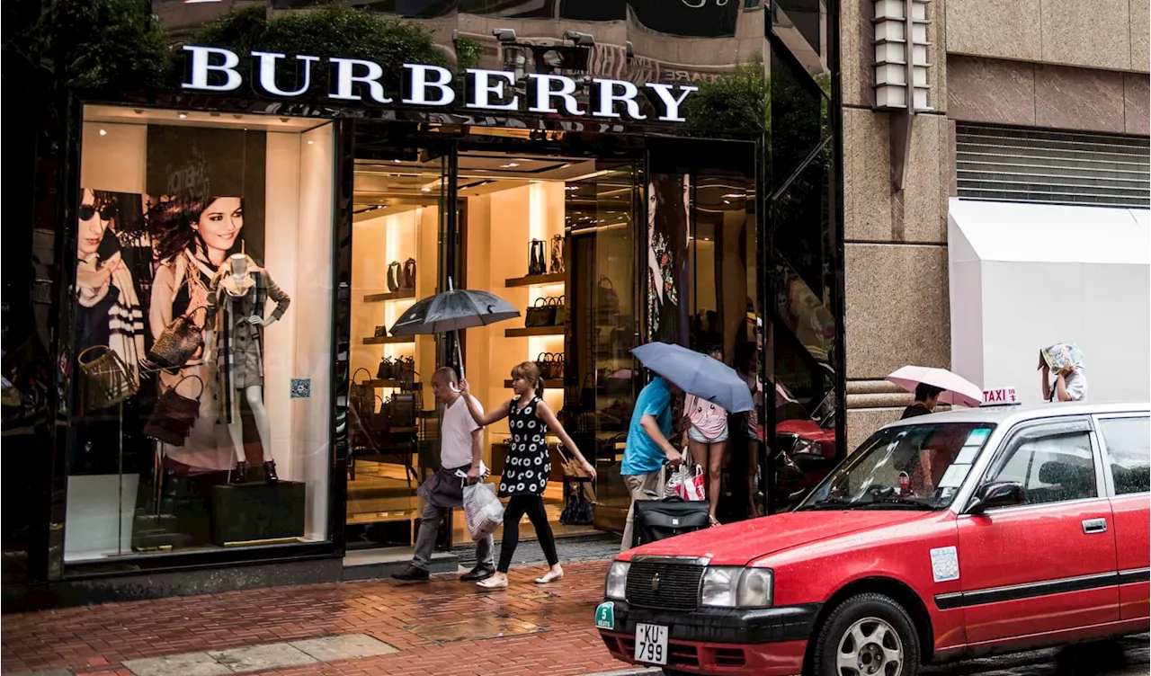 Burberry shares drop 15% after the luxury giant issues profit warning and replaces CEO