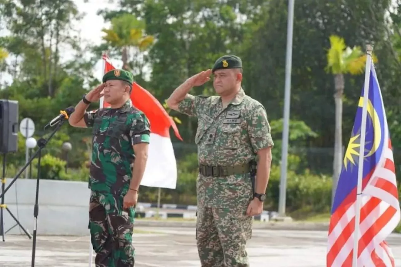 Indonesian and Malaysian Armed forces conduct joint border patrol in Kalimantan