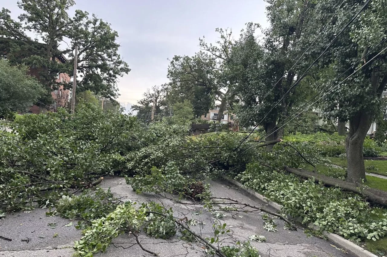 A dam is near failure in Illinois after heavy rains and tornadoes sweep the Midwest