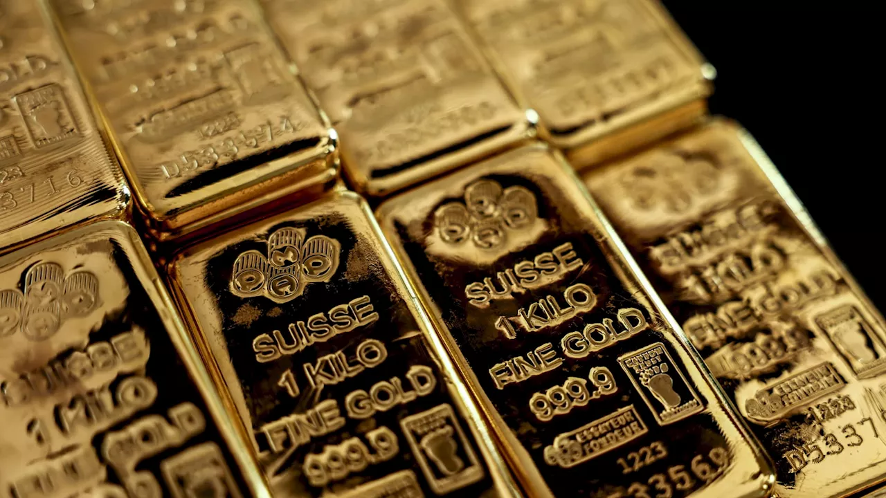 Gold futures jump to record above $2,460 an ounce on hopes Fed will soon cut rates