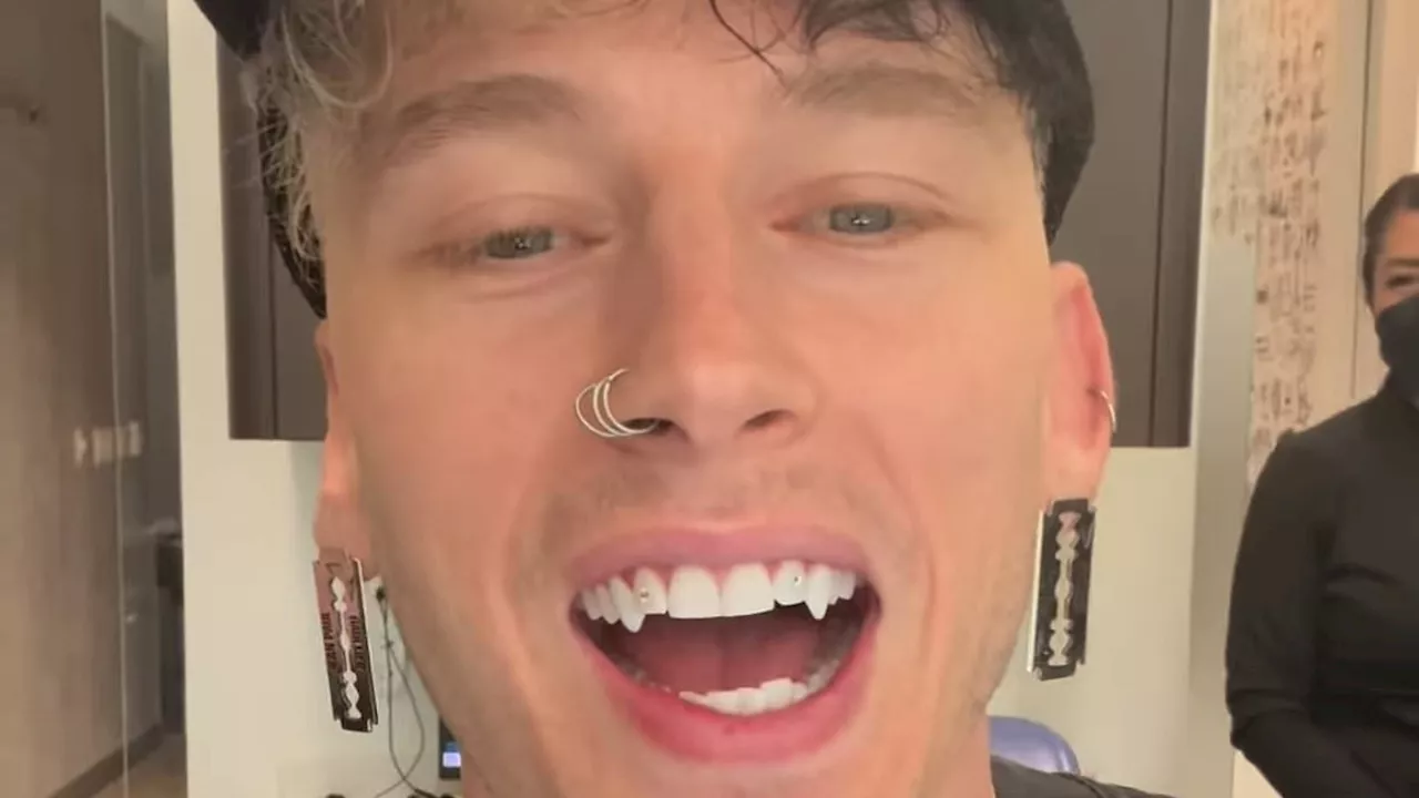 Machine Gun Kelly unveils his new diamond-studded VAMPIRE FANGS