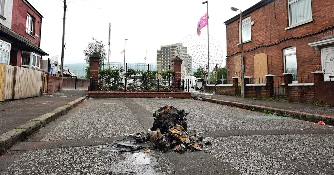 Groups of up to 50 young people throw petrol and paint bombs at police in Belfast overnight