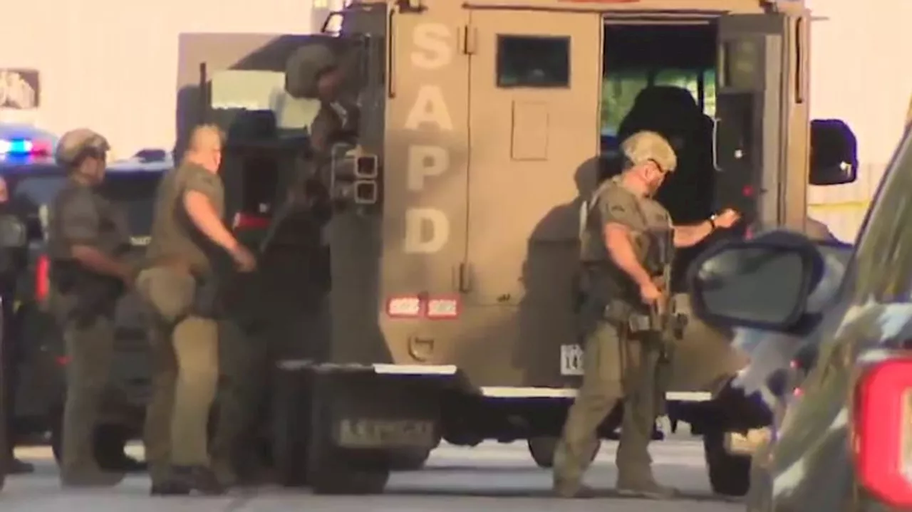 SWAT uses tear gas, K-9 unit to locate shooting suspect barricaded in Southwest Side home