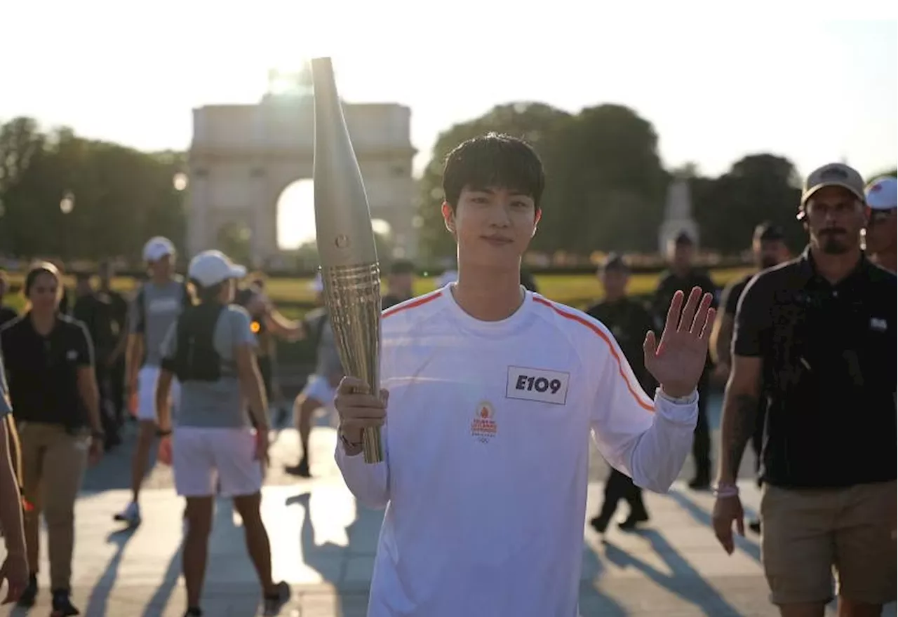 BTS singer Jin takes part in Paris Olympics torch relay