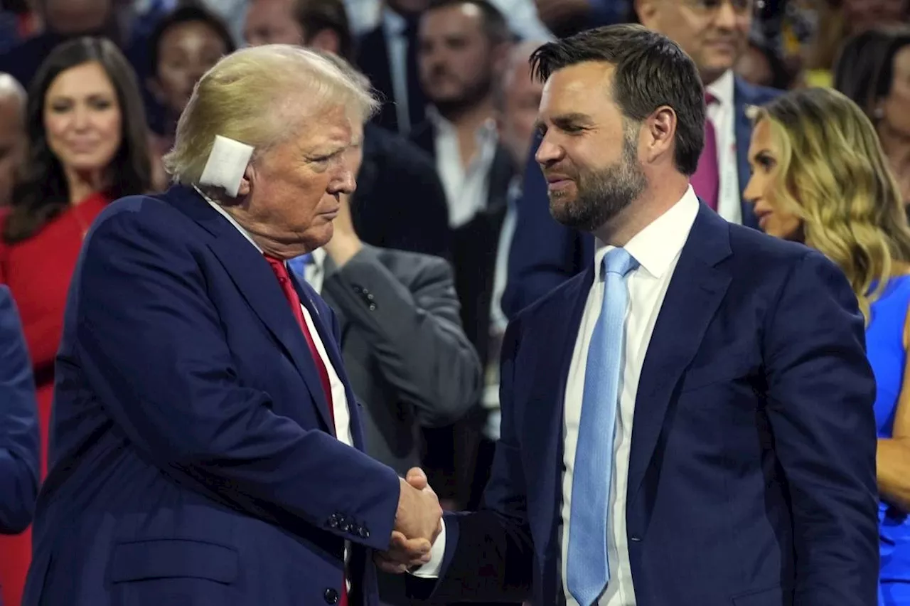 Donald Trump enters Republican convention hall with a bandaged ear and gets a hero's welcome