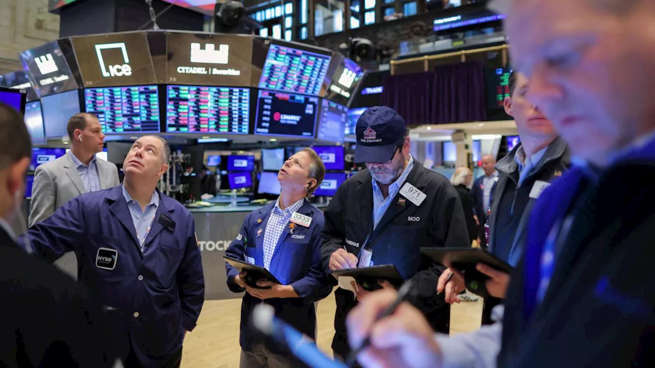 Dow reaches new intraday high at market open