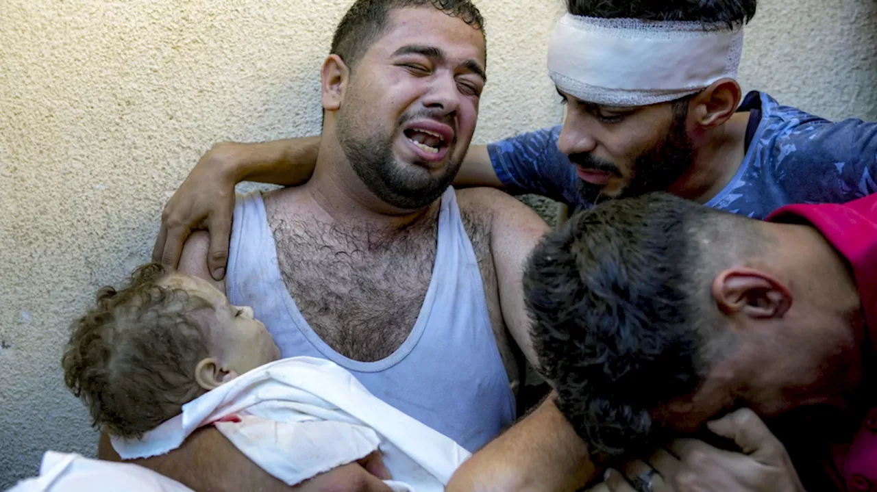 A Gaza father mourns his baby boy, killed in bed by an Israeli airstrike