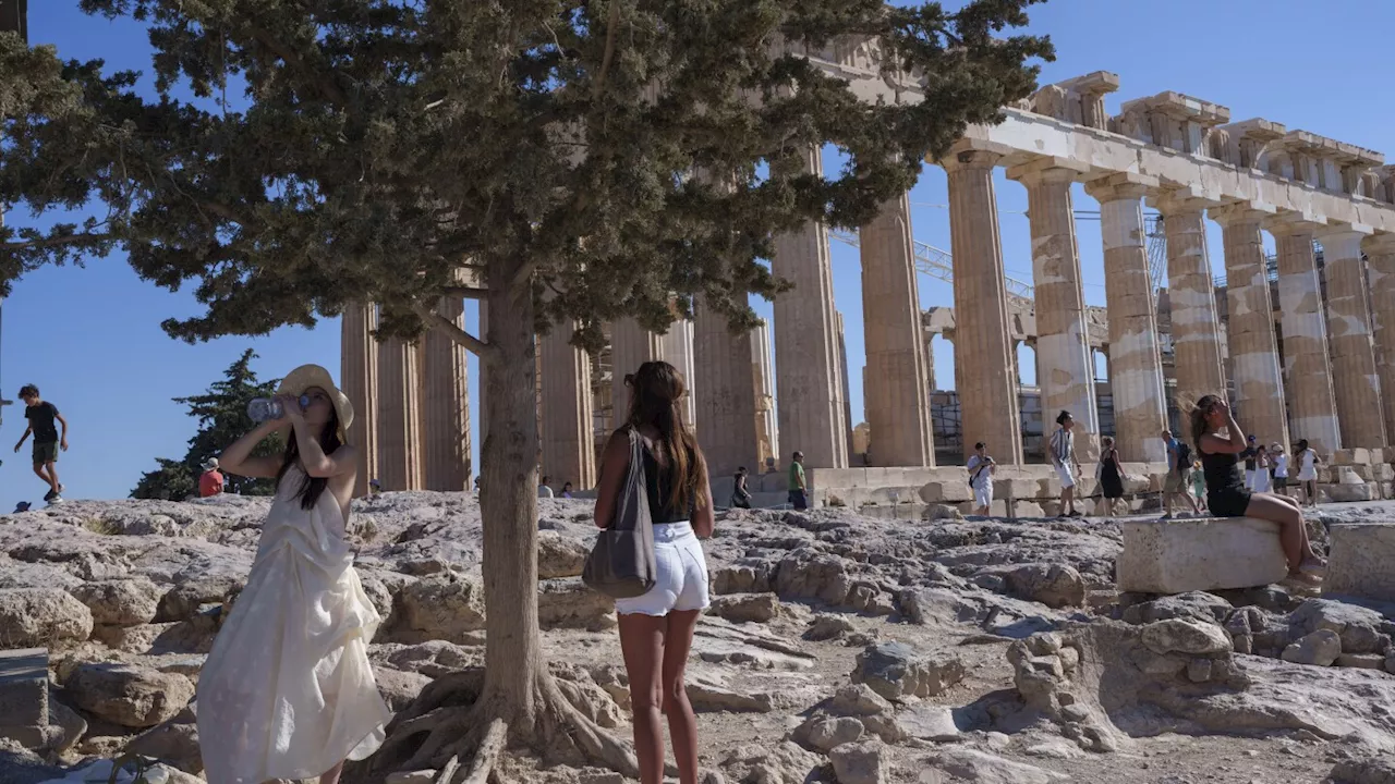 Greece shuts Acropolis during hottest part of day as southern Europe swelters in a heat wave