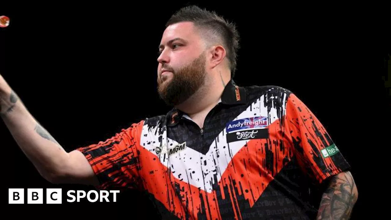 World Matchplay Darts: Michael Smith and Michael van Gerwen reach quarter-finals