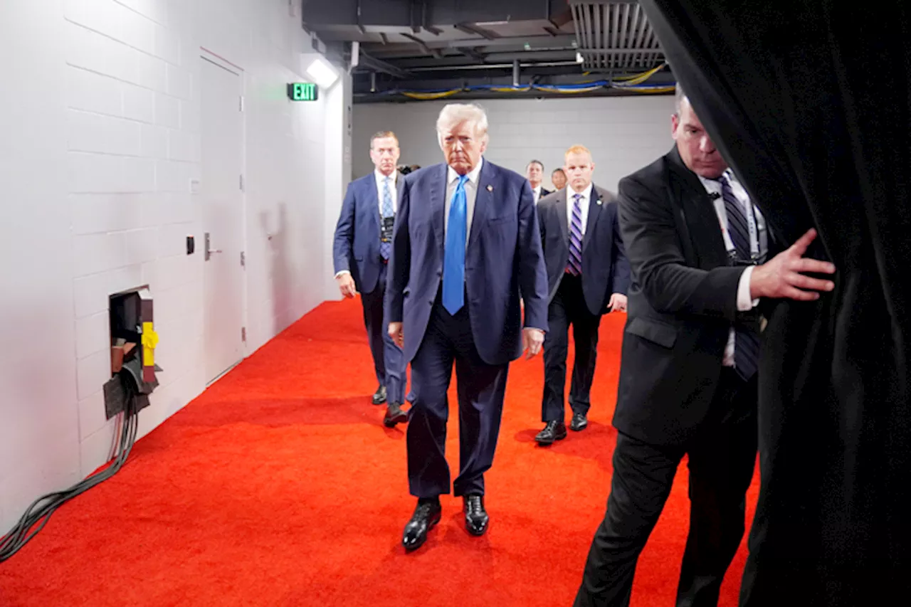 Stepped-up security around Trump apparent, with agents walling him off from RNC crowds | Jill Colvin / The Associated Press