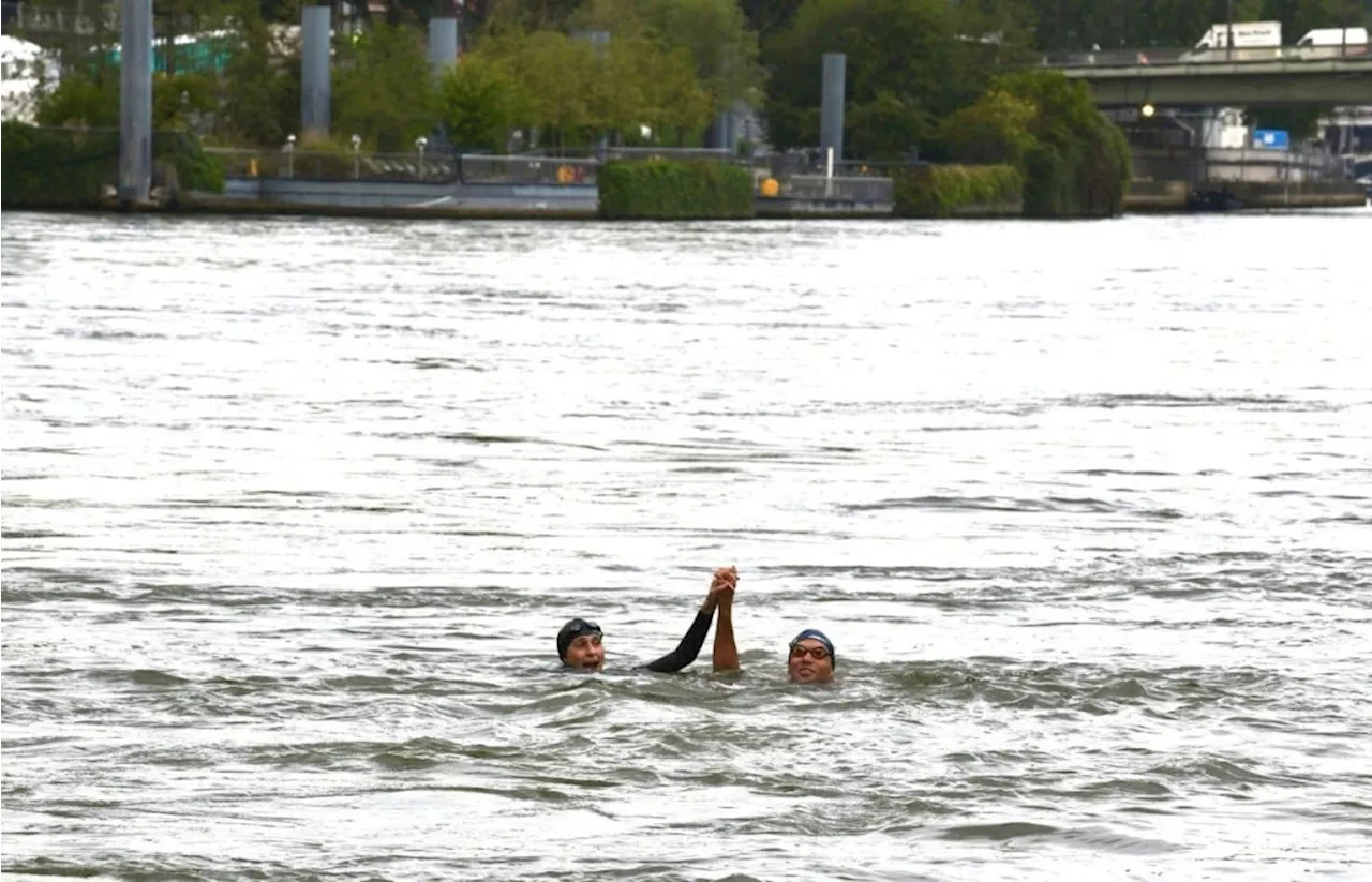 Paris mayor dips into the Seine River to showcase its improved cleanliness before Olympic events