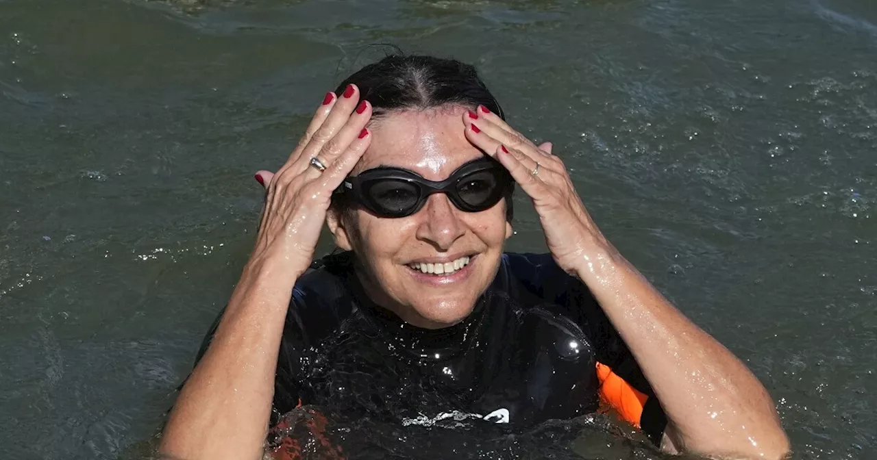 Paris mayor dips into the Seine River to showcase its improved cleanliness before Olympic events