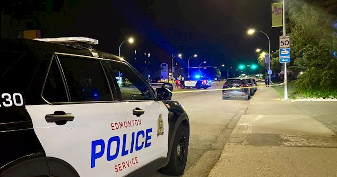 Edmonton police tape off part of Whyte Avenue, witness describes rush of responders