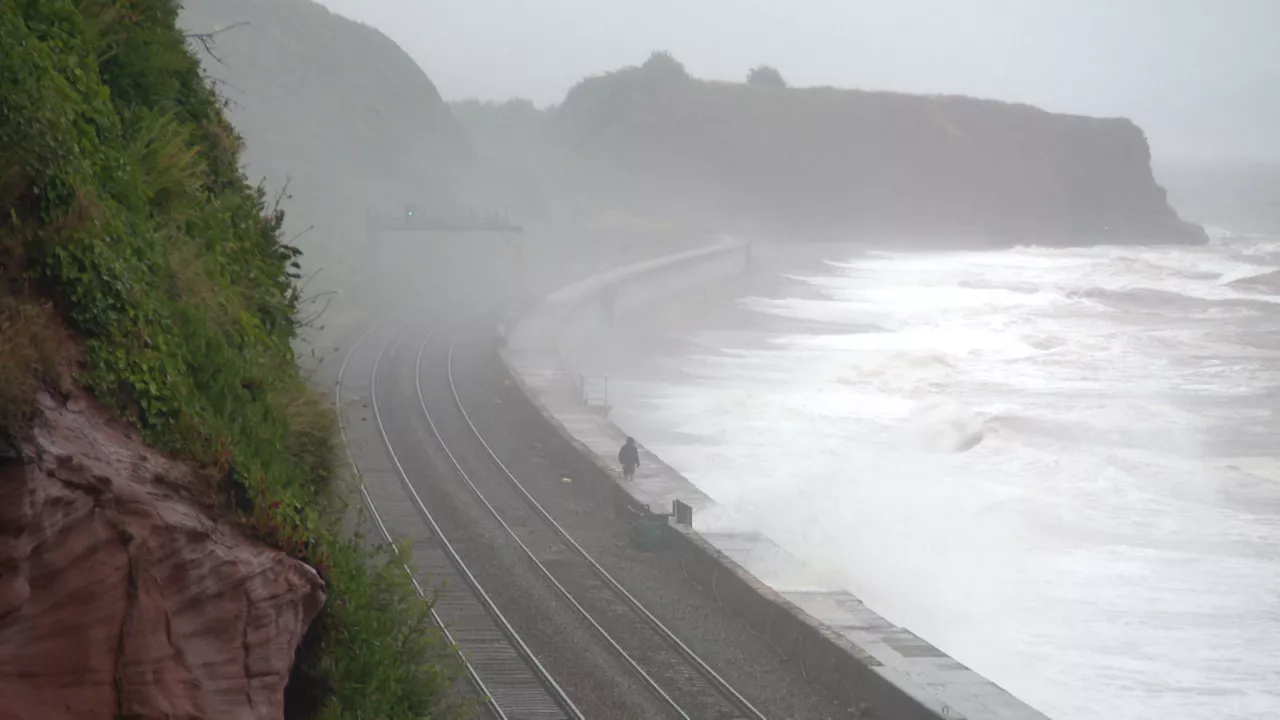 Woman in mobility scooter dies after falling from Dawlish sea wall