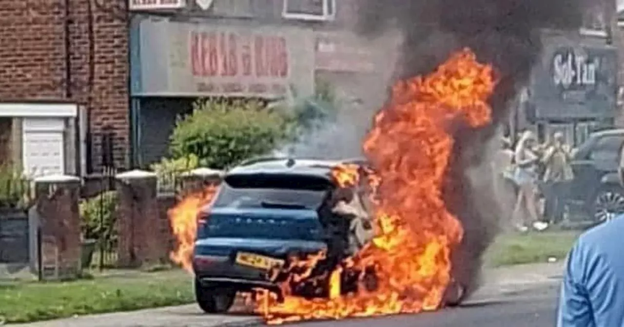 Horror as man and child suffer burns injuries after Volvo bursts into flames