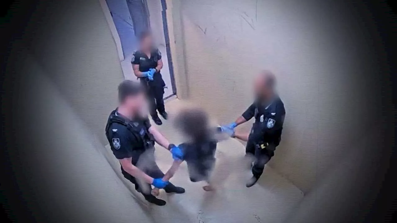 Exclusive footage shows children being placed in isolation cells in Queensland